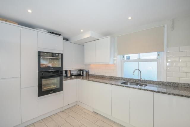Property photo 2 of 8 Kitchen