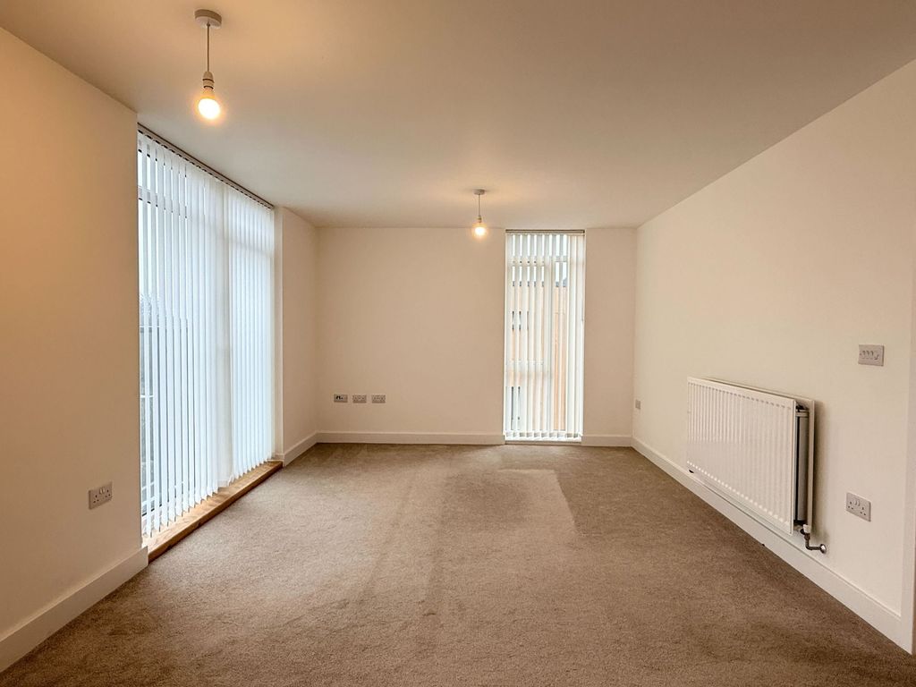 Property photo 3 of 13 Living Area