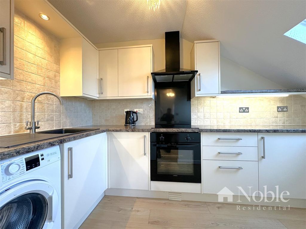 Property photo 3 of 12 Kitchen