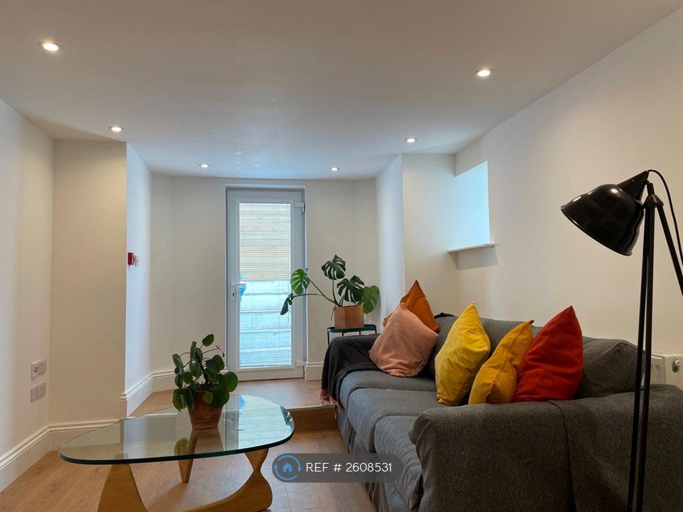 Property photo 1 of 19 Living Area/Patio Door
