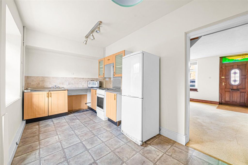 Property photo 3 of 13 Dining Kitchen