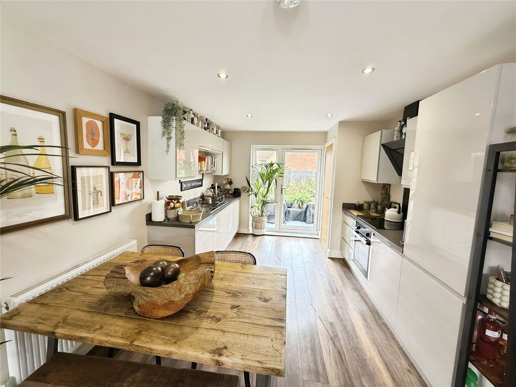 Property photo 2 of 12 Kitchen Living Area