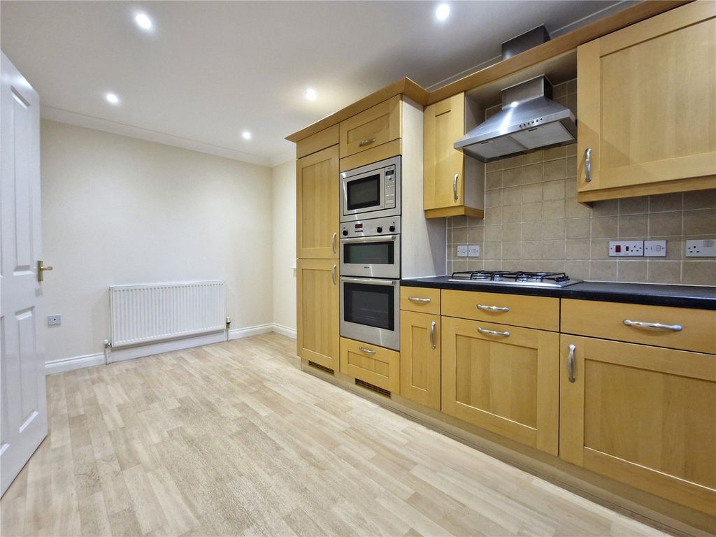 Property photo 2 of 12 Kitchen