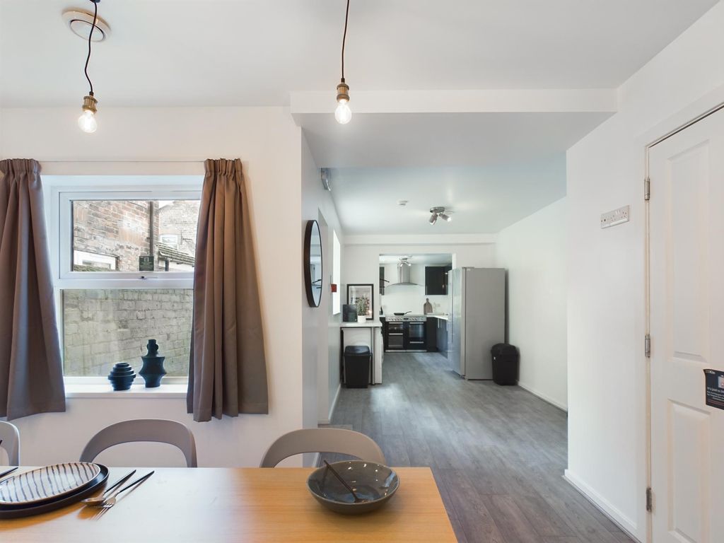 Property photo 1 of 17 Bright And Inviting Living Room With Ample Natural...