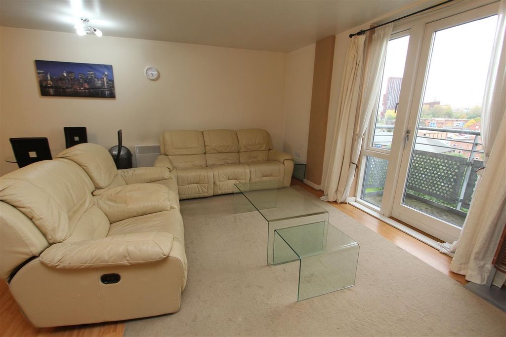 Property photo 3 of 8 Bright Living Room With Balcony And Comfy Sofas...