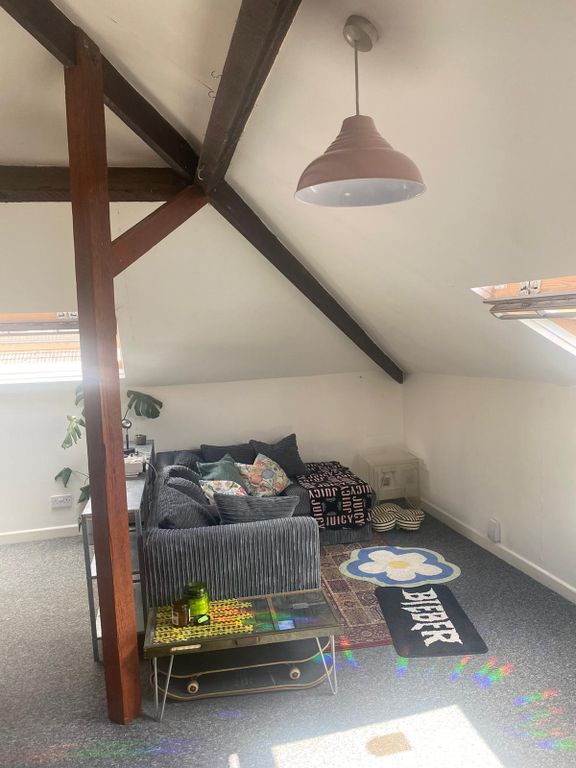 Property photo 1 of 5 Bright Attic Living Area With Exposed Beams, A Cos...
