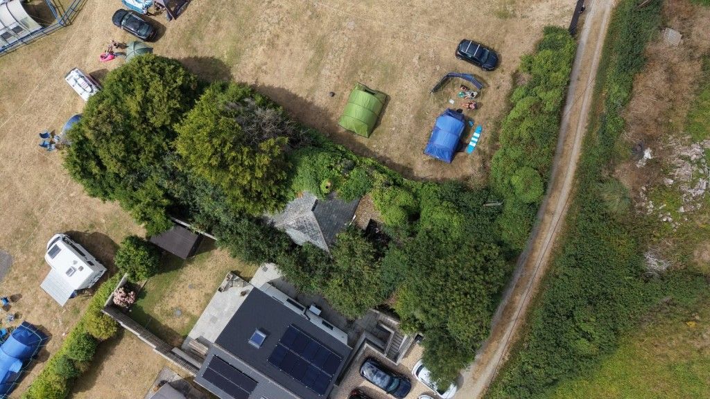 Property photo 2 of 5 Close Up Birds-Eye-View Of Property And Grounds