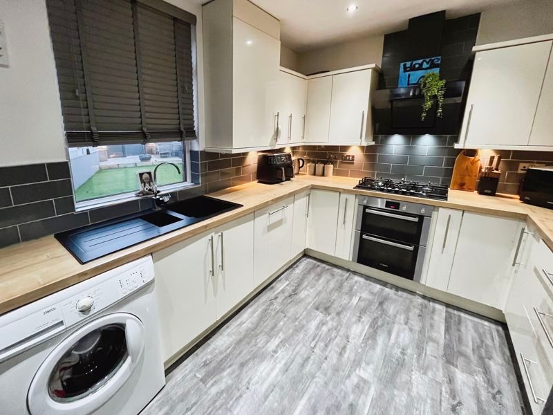 Property photo 3 of 12 Kitchen