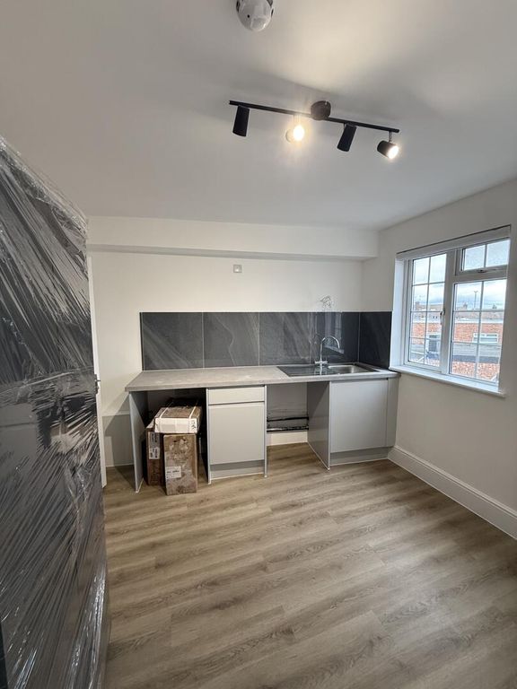 Property photo 1 of 7 Kitchen