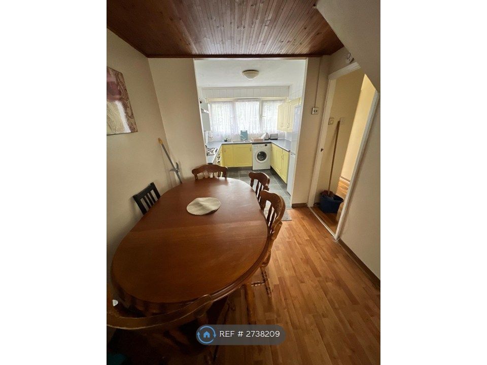 Property photo 2 of 10 Dining Room + Kitchen