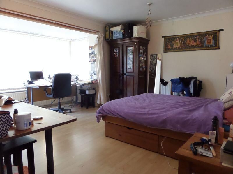 Property photo 2 of 9 A Spacious And Well-Lit Master Bedroom Featuring A...