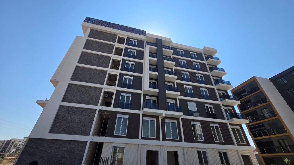Property photo 1 of 11 Prime Location Antalya Homes In Altintas For Sale - Main View Of The Apartment Building