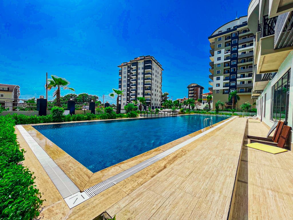 Property photo 2 of 22 Exceptional Two-Storey Furnished Apartment In Alanya For Sale In Avsallar - Shared Outdoor Pool And Terraces