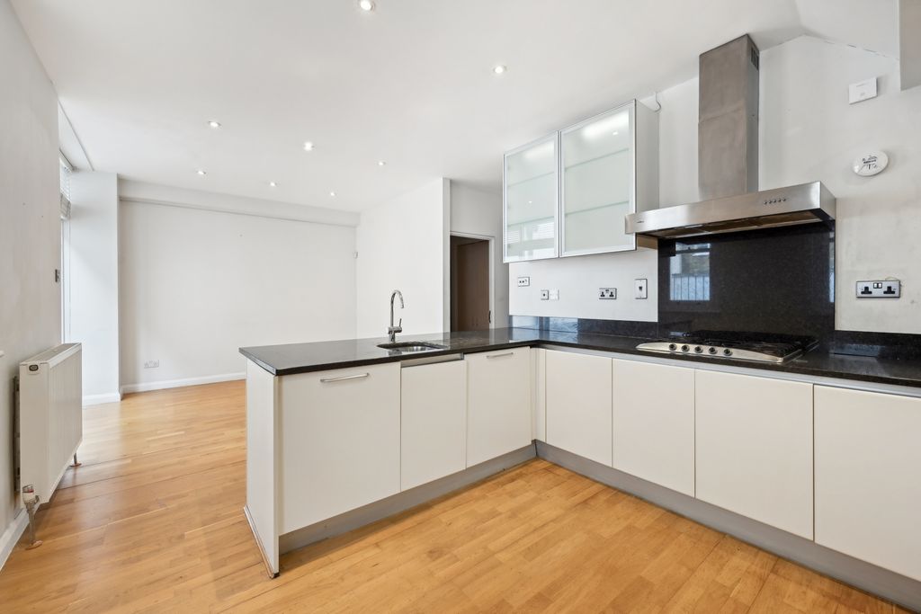 Property photo 3 of 12 Kitchen