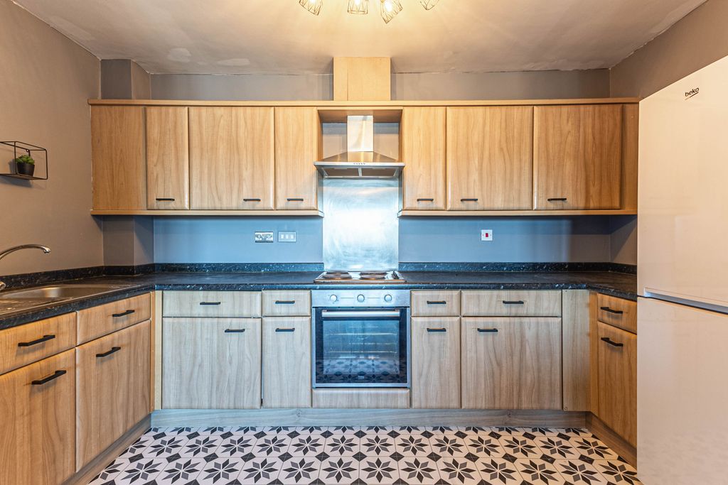 Property photo 3 of 13 Kitchen