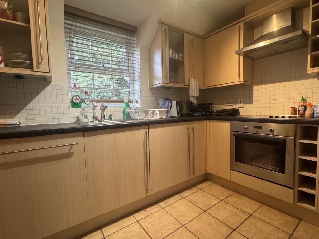 Property photo 3 of 7 Kitchen