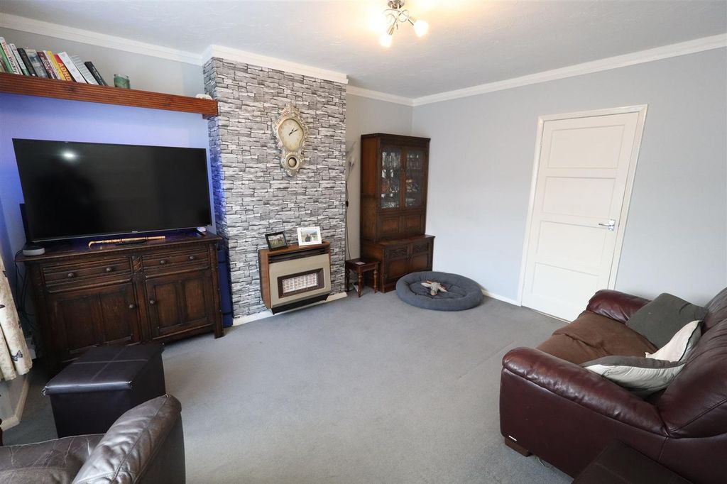 Property photo 3 of 12 Living Area