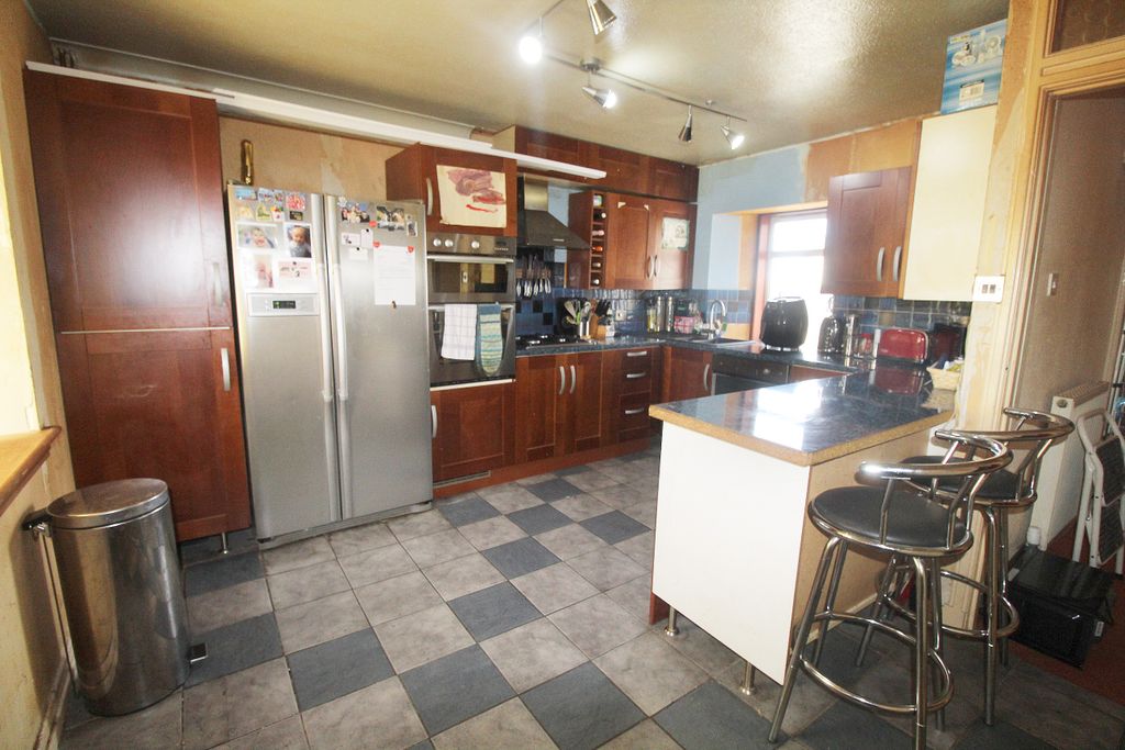 Property photo 3 of 13 Dining Kitchen