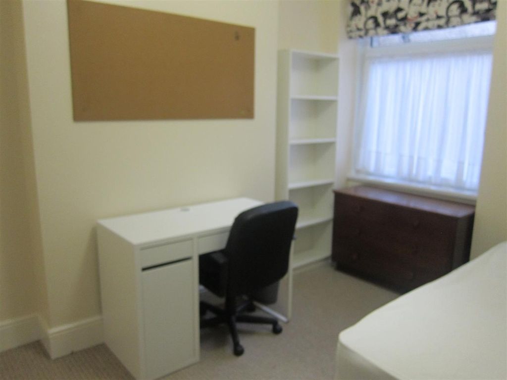 Property photo 3 of 7 Bright Study Area With Desk And Ample Storage...