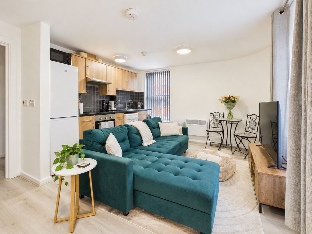 Property photo 2 of 11 Teal Sofa Open-Plan Interior