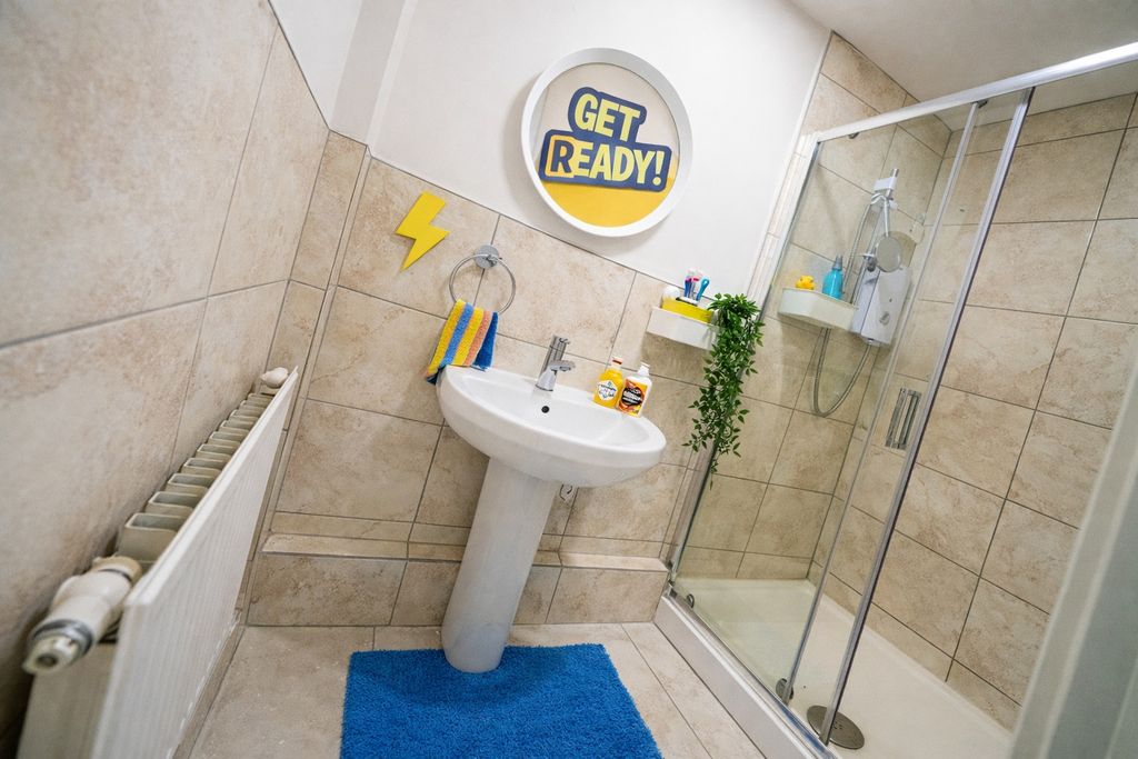 Property photo 1 of 7 Modern Bathroom With Walk-In Shower And Basin...