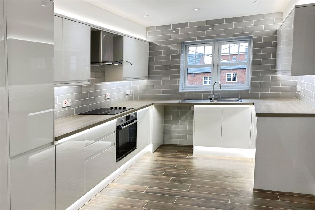 Property photo 2 of 6 Kitchen Area