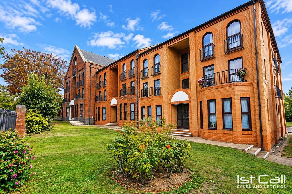 Property photo 1 of 13 Brick Apartment Complex With Flowering Gardens(1).