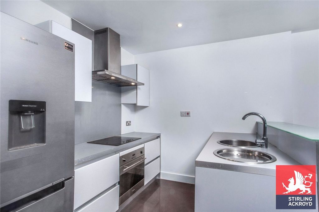 Property photo 3 of 13 Kitchen