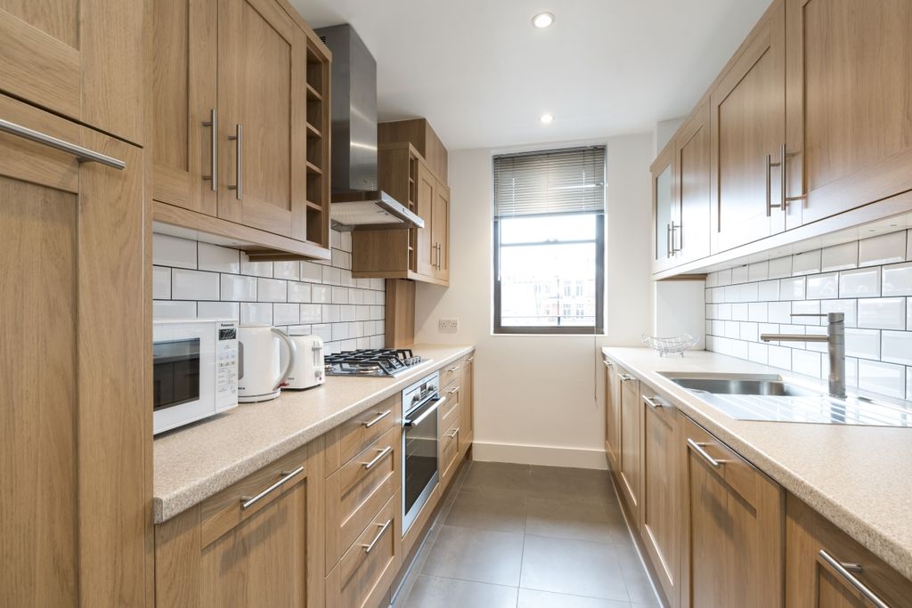 Property photo 3 of 12 Kitchen