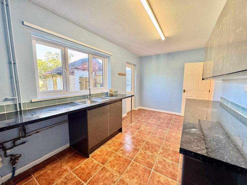 Property photo 3 of 13 Kitchen View