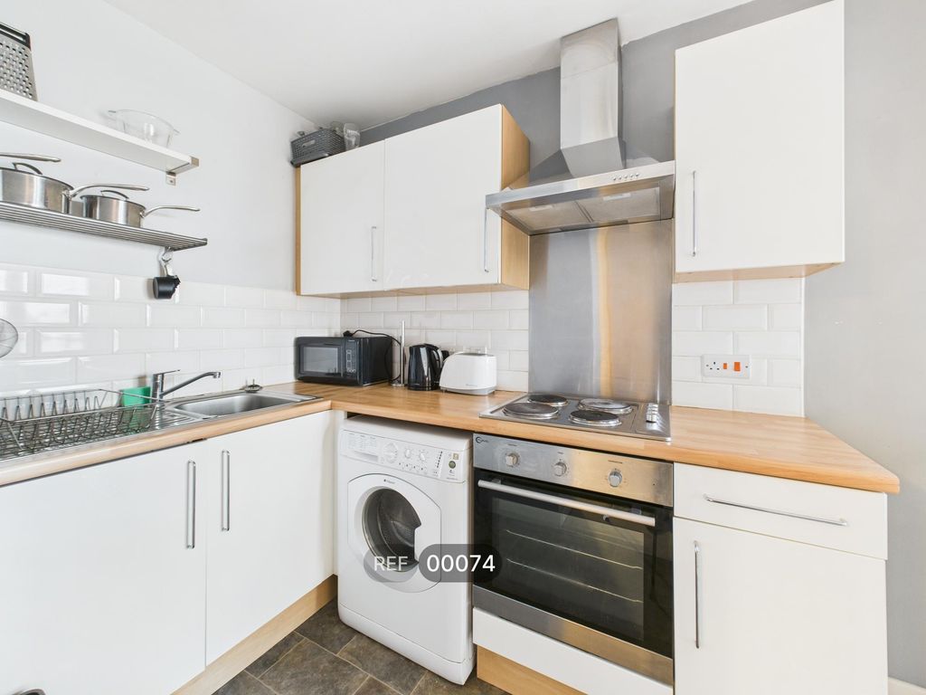 Property photo 1 of 13 Kitchen &amp; Living Area