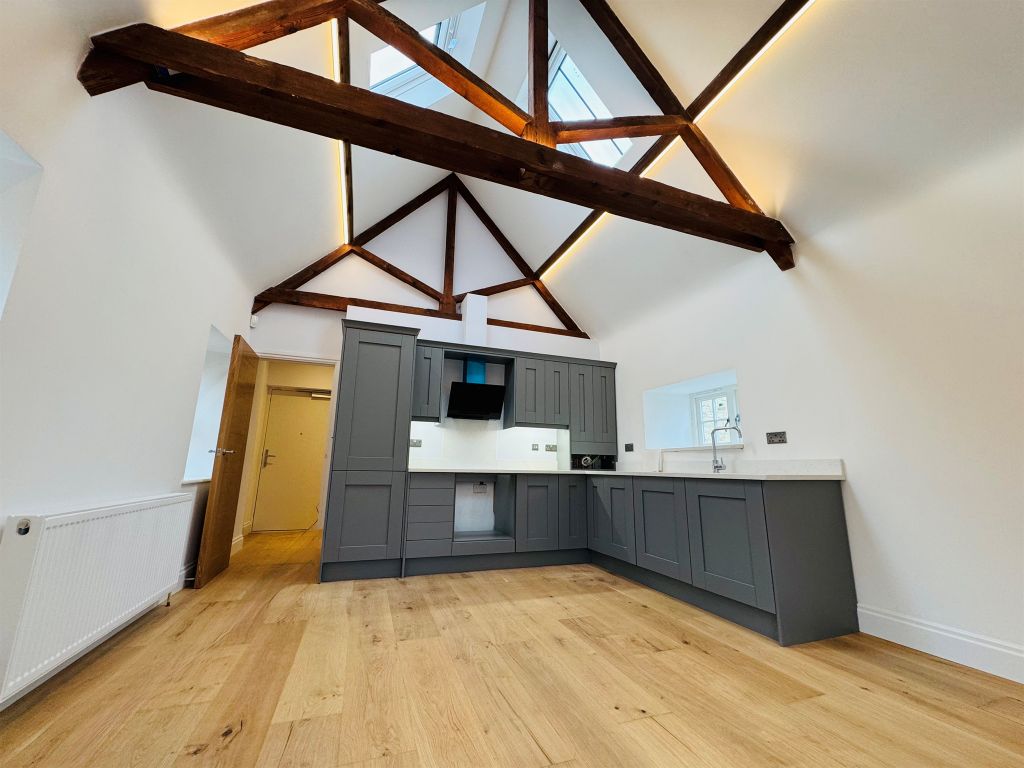Property photo 3 of 8 Kitchen Area