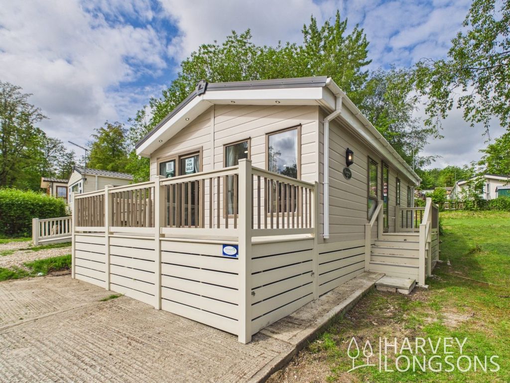 Property photo 1 of 18 Exterior With Decking Of The Delta Cambridge Holiday Lodge At Beauport Holiday Park, East Sussex