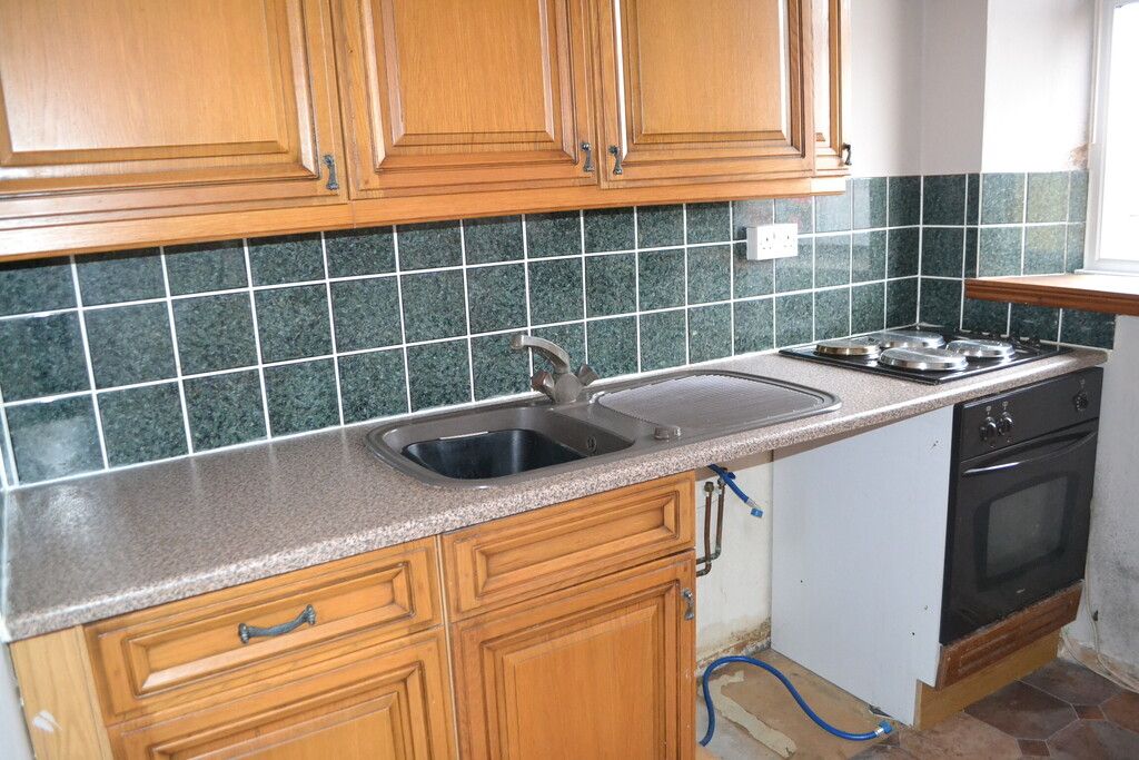 Property photo 3 of 7 Kitchen