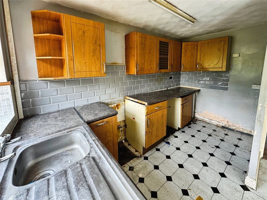 Property photo 3 of 13 Dining Kitchen