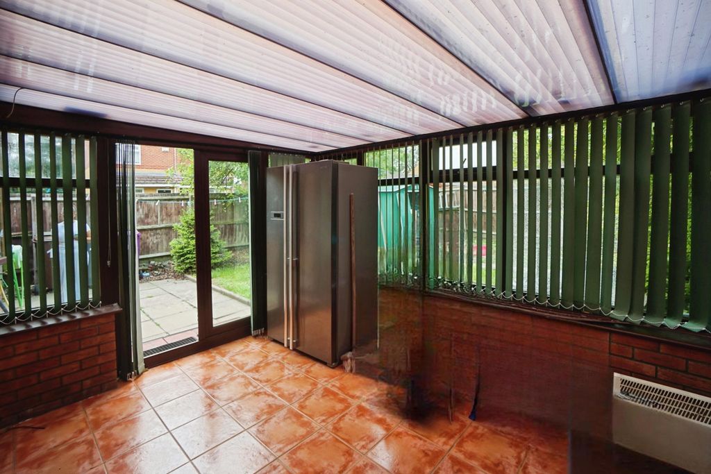 Property photo 3 of 12 Conservatory