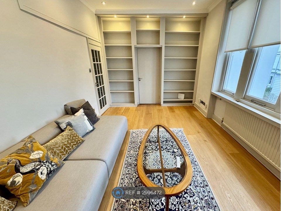 Property photo 2 of 11 Living Room With Built-In Shelving