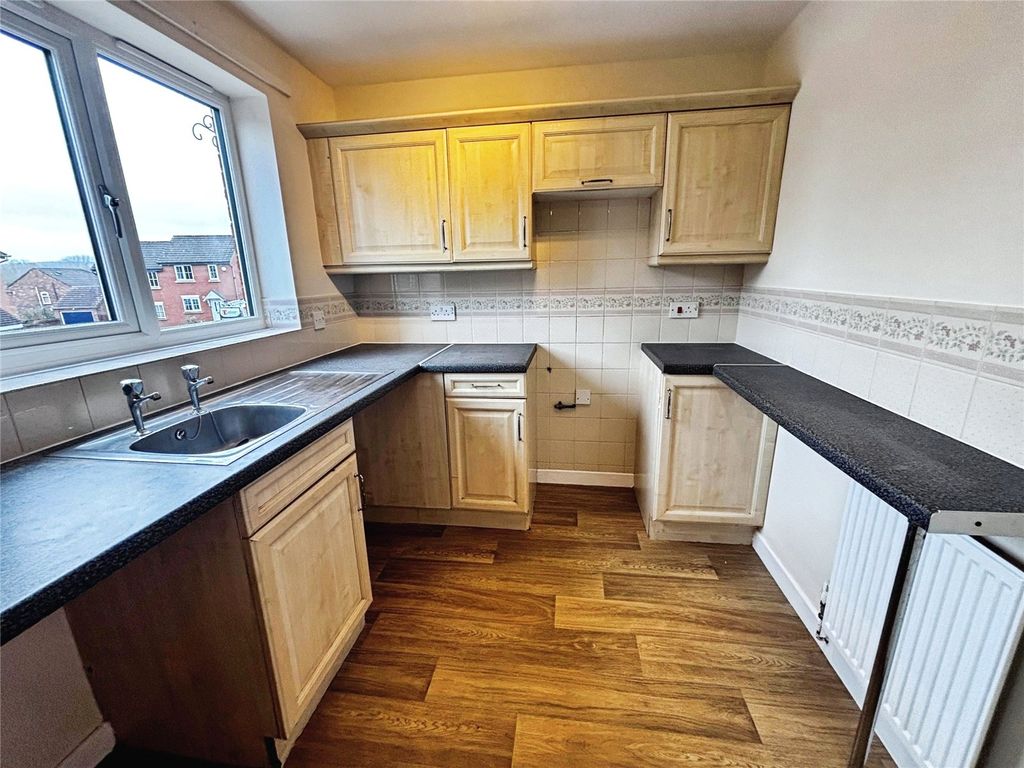 Property photo 2 of 12 Kitchen