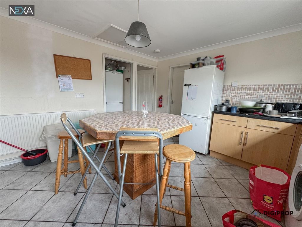 Property photo 3 of 15 Spacious Kitchen With A Social Dining Island...