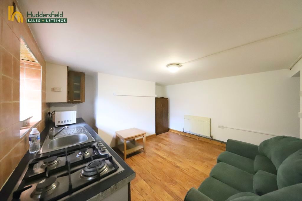 Property photo 1 of 8 Living Area