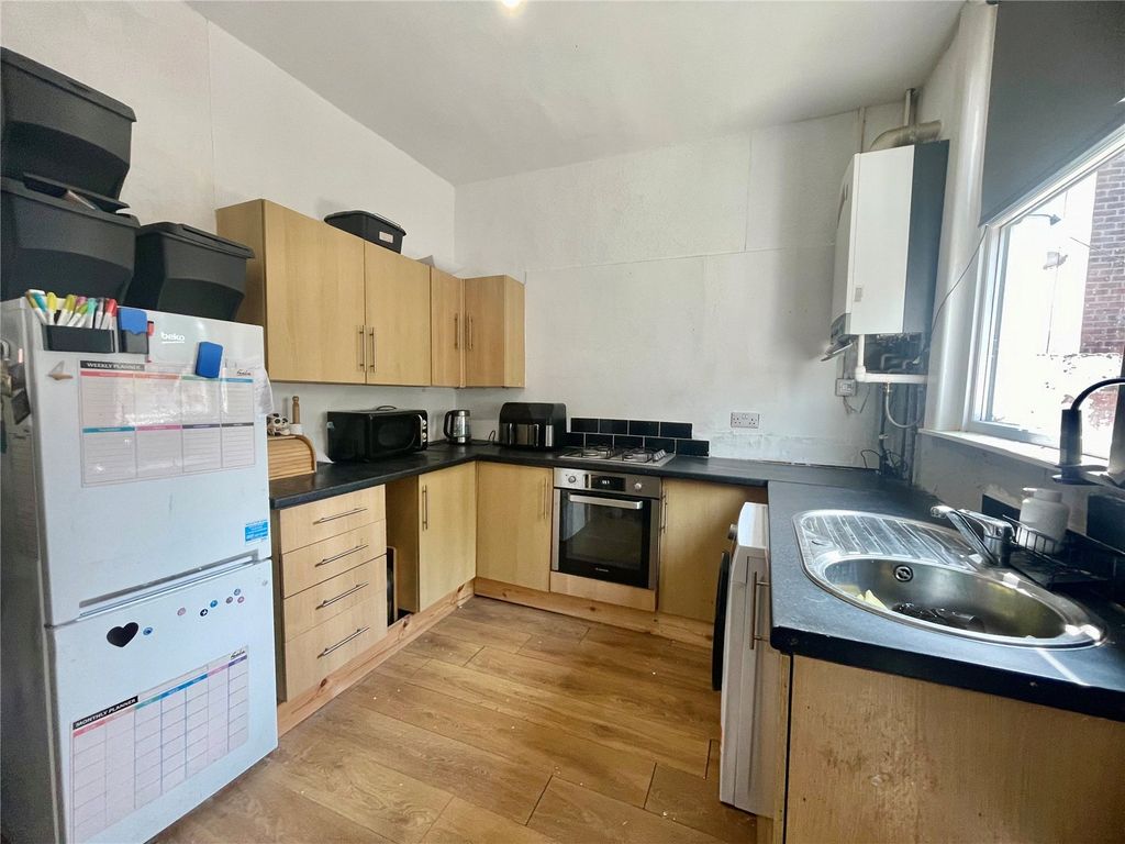 Property photo 1 of 12 Kitchen