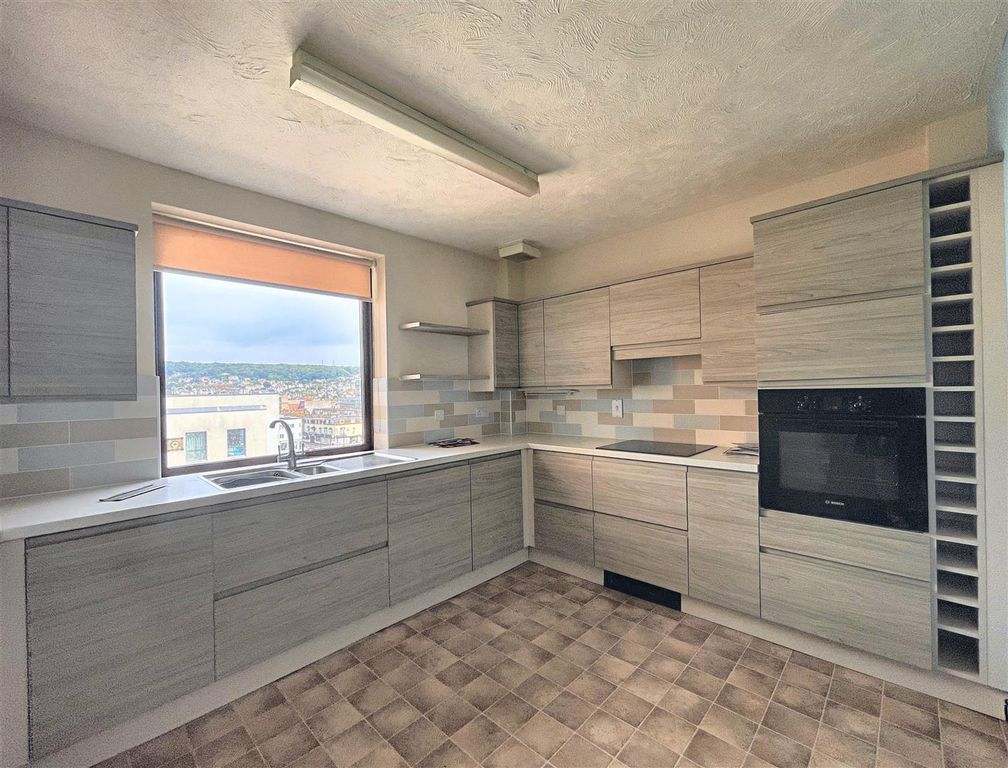 Property photo 3 of 12 Kitchen