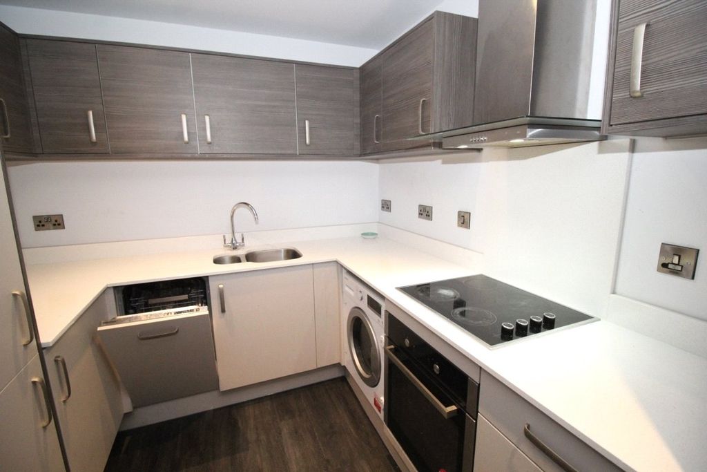 Property photo 3 of 8 Kitchen Area