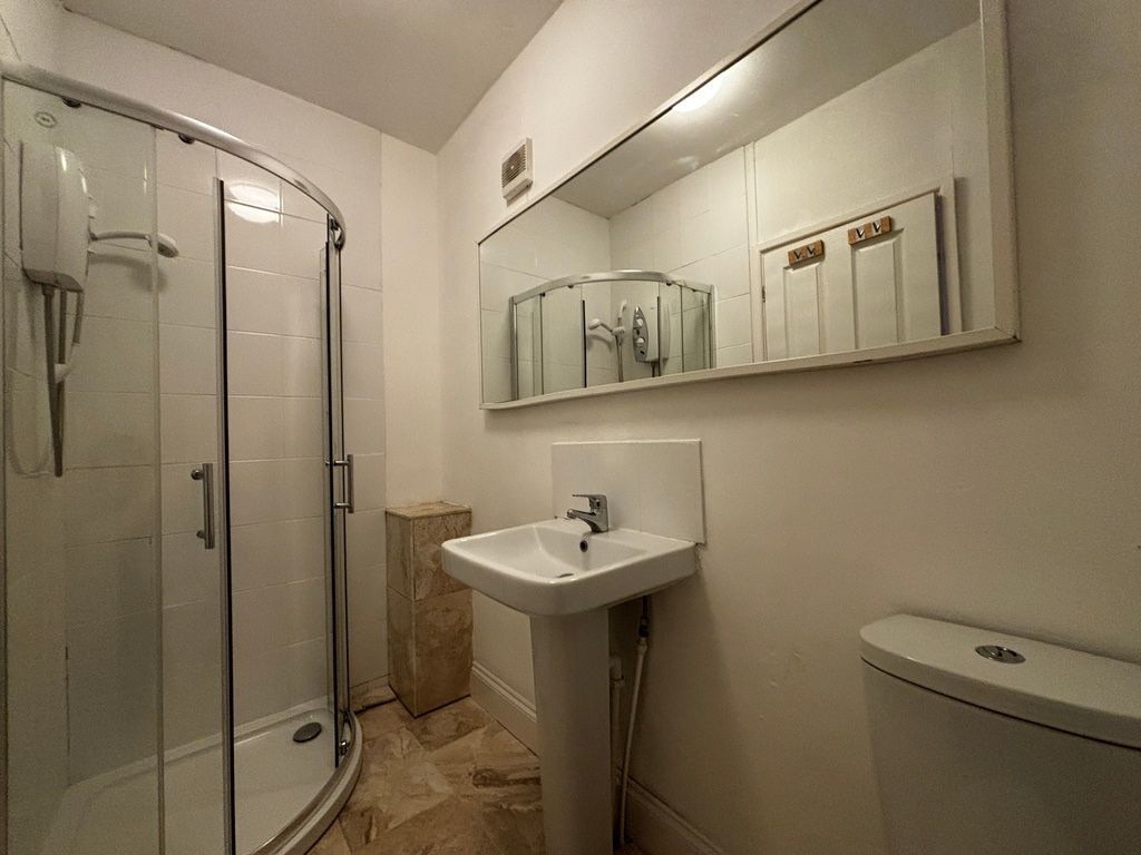 Property photo 3 of 8 Modern Bathroom With Sleek Curved Shower Cubicle...