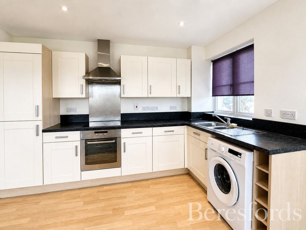 Property photo 2 of 9 Kitchen Area