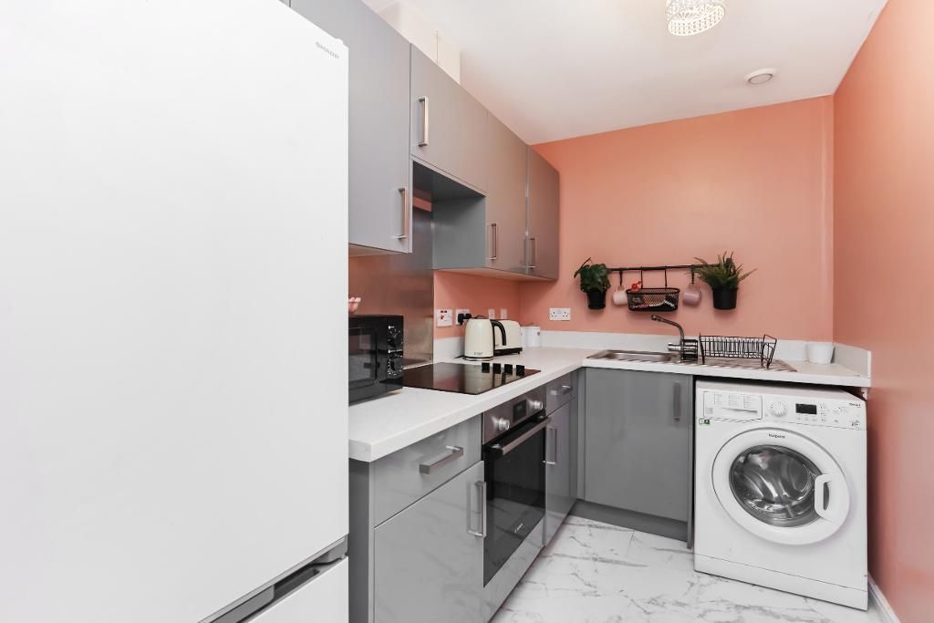 Property photo 3 of 16 Kitchen