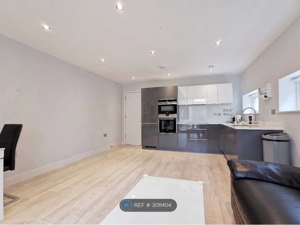 Property photo 3 of 12 Living Room And Kitchen