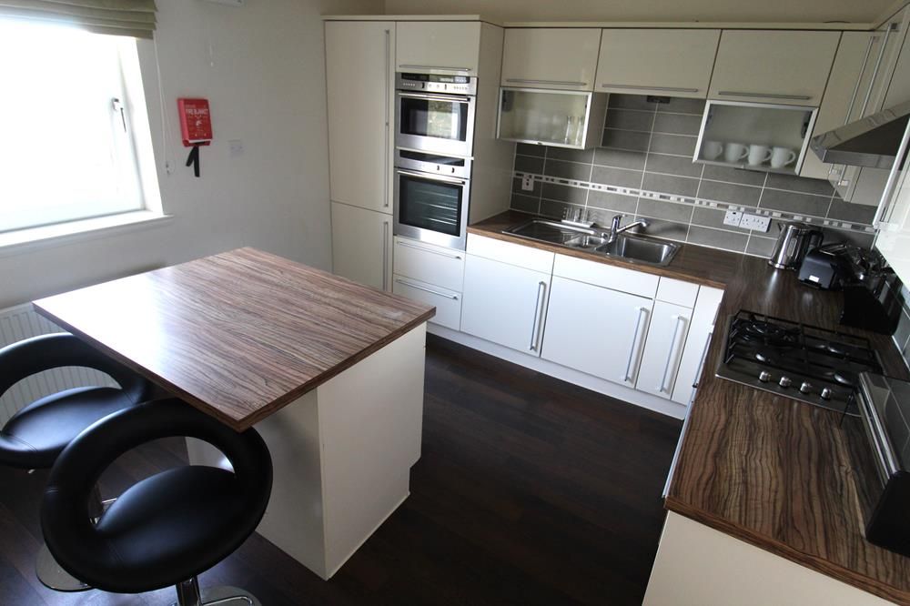 Property photo 3 of 9 Kitchen