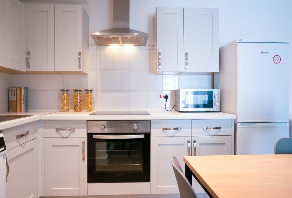 Property photo 3 of 7 A Modern And Clean Kitchenette Featuring Ample Sto...