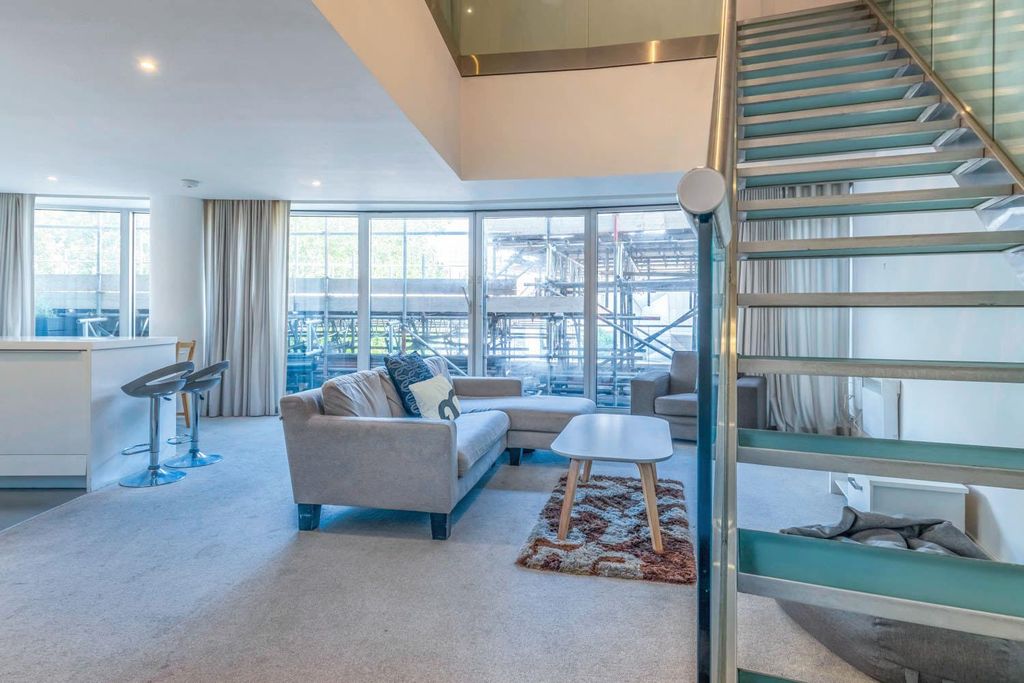 Property photo 3 of 16 Living Area